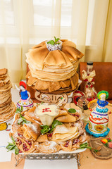 A variety of original pancakes in the contest during the celebration Russian Shrovetide (pancake week) at school