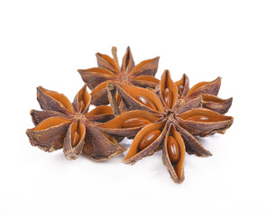 Star anise spice fruits and seeds isolated on white background