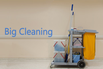 Big Cleaning word concept, Cleaning Cart in the hospital with wall background.