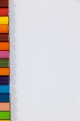 Close-up of colored pencil in a row