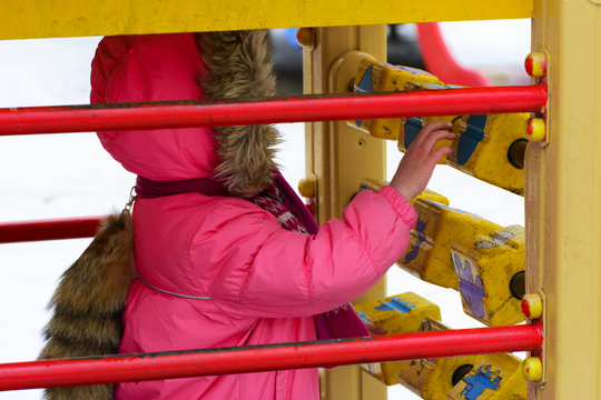 Children Play On The Playground In The Winter On A Holiday Maslenitsa