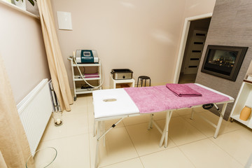 Professional bed in beautician spa salon