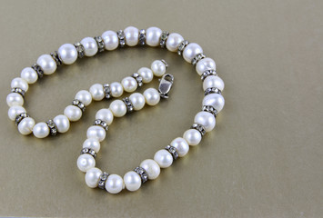 Women's jewelery and jewelery on a white background