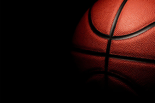 basketball on black background.