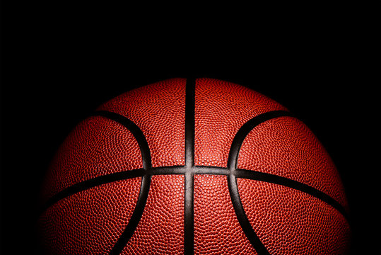 basketball on black background.