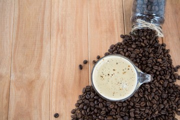 Coffee with coffee beans and jar