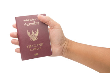 Male hand holding Thailand passport isolated on white background