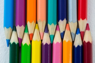 Colored pencils arranged in interlock pattern 