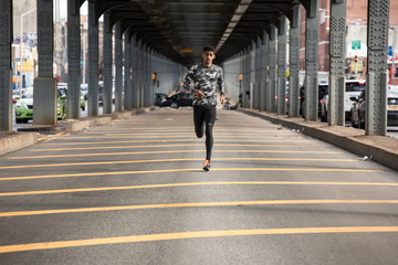 A young man goes for a jog in New York City