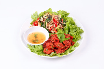 Fried spicy basil with minced pork and curried fish cake.