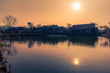 sunset view of cityscape along riverside,located in China.