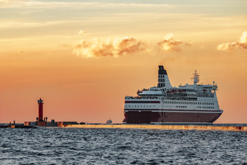 Red cruise liner. Passenger ferry sailing from Riga to Stockholm