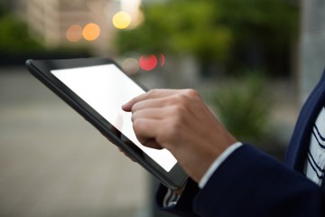 Business executive using digital tablet