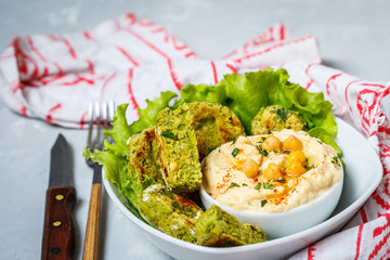 Bright green falafel with hummus. Love for a healthy vegan food concept