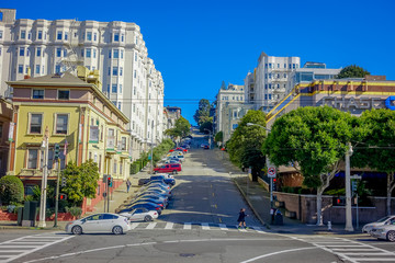 Beautiful touristic view of the iconic Lombard street hill in downtown San Francisco