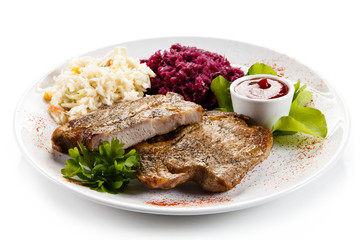 Roast steaks with vegetables