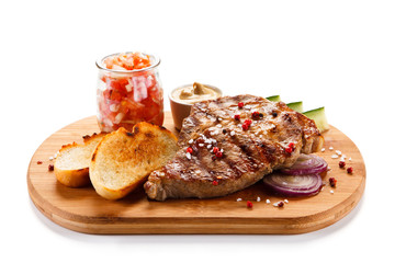 Grilled steak on cutting board