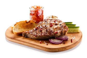 Grilled steak on cutting board