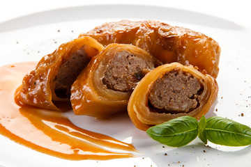 Wrapped meat with tomato sauce