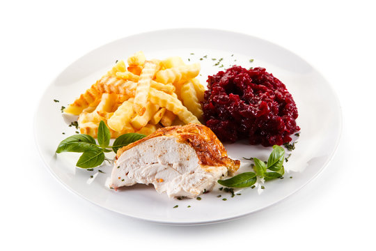 Roast chicken meat with french fries