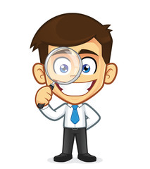 Businessman holding a magnifying glass