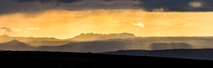 Colorful sunset over mountains. Fantastic view of icelandic landscape. Iceland.