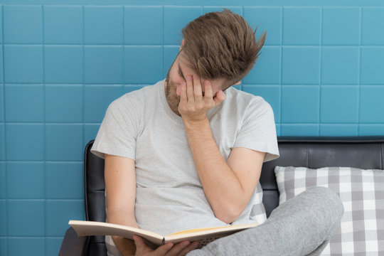 young man confuse when he reading book