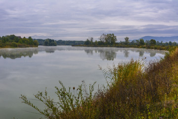 Lake in the mountains for recreation and fishing. Early morning