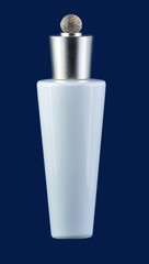 White ceramic bottle with perfume isolated on blue 