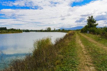 Lake in the mountains for recreation and fishing. Early morning