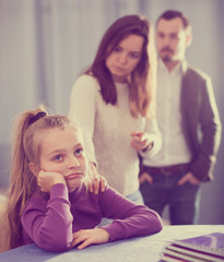 Obraz na płótnie Canvas Parents lecturing daughter