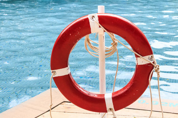 Close up of red life ring at the pool