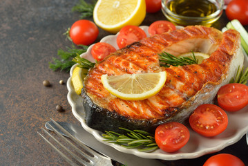 Roasted salmon steak with lemon