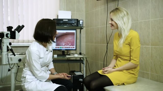 A visit to the doctor. A young woman is on consultation at gynecologist. HD