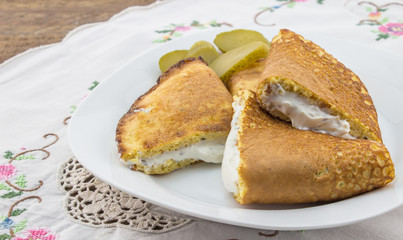Egg and oatbran gallette filled with garlic and herb smooth cottage cheese