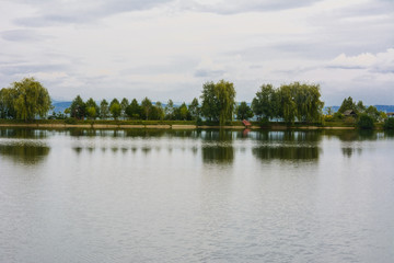 Fototapeta na wymiar Lake in the mountains for recreation and fishing