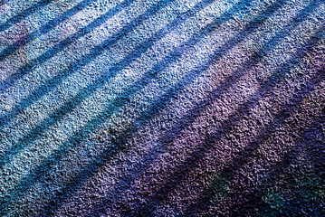 Line shades on a painted wall