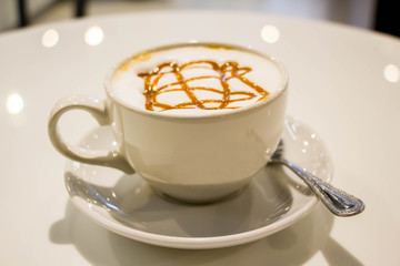 Latte coffee in white cup