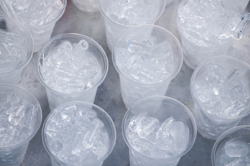 ice cubes in plastic cup