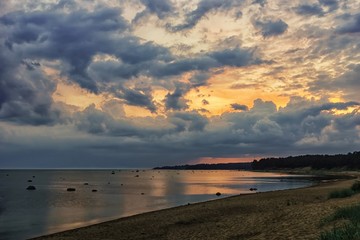 big clouds and sunset at the baltic sea
