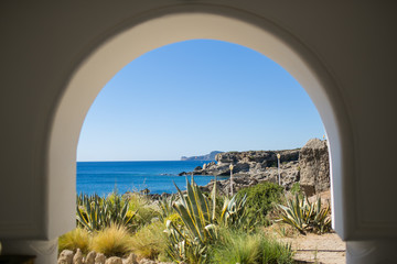 RHODES, GREECE: Arch of terrace and view of sea