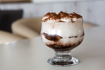 Delicious tiramisu and coffee beans