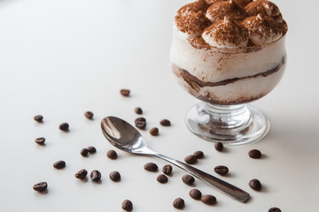 Delicious tiramisu and coffee beans