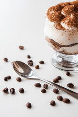 Delicious tiramisu and coffee beans