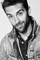 Smiling hunk in denim, close up