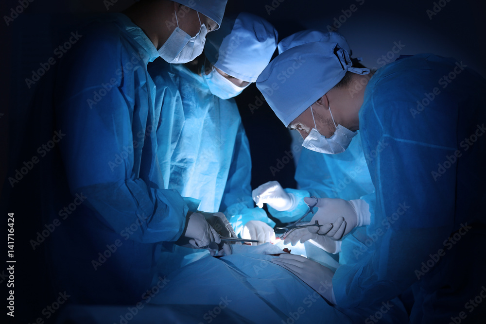 Poster Surgeons operating patient in clinic