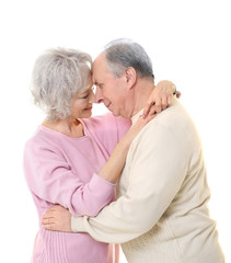 Happy senior couple isolated on white