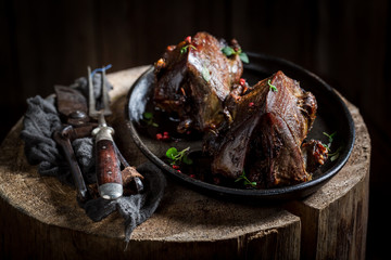Two grilled pigeons with spices and pepper