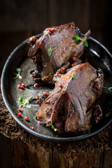 Two wild pigeons with spices and pepper