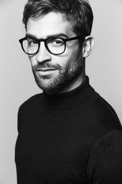 Man in spectacles looking at camera
